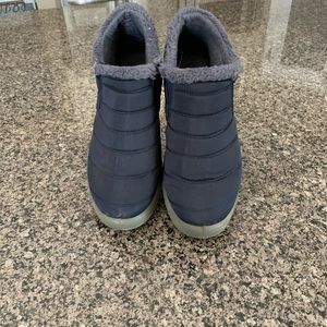 Size 9 fur slip on navy bootie. Like new